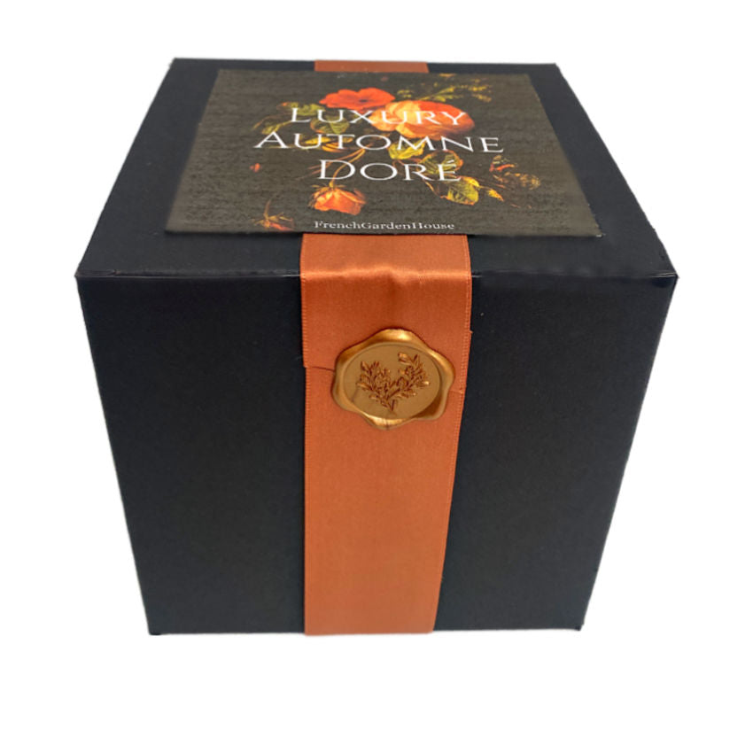 Designer fall gift candleboxed with ribbon