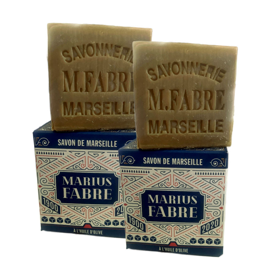 Two Marseille soap bars with their Anniversary 120 years packaging pecial edition