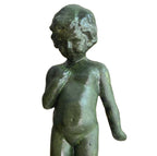 Close detail of aged cold painted surface on mid-century decorative figure