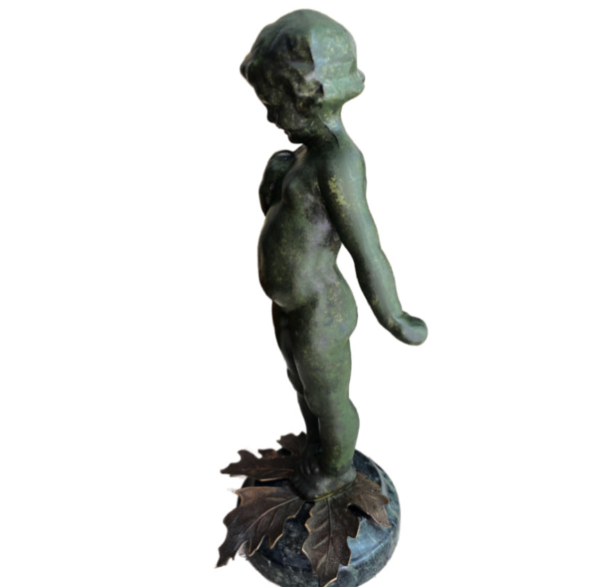 Side profile view mid-century child figural sculpture with original paint wear