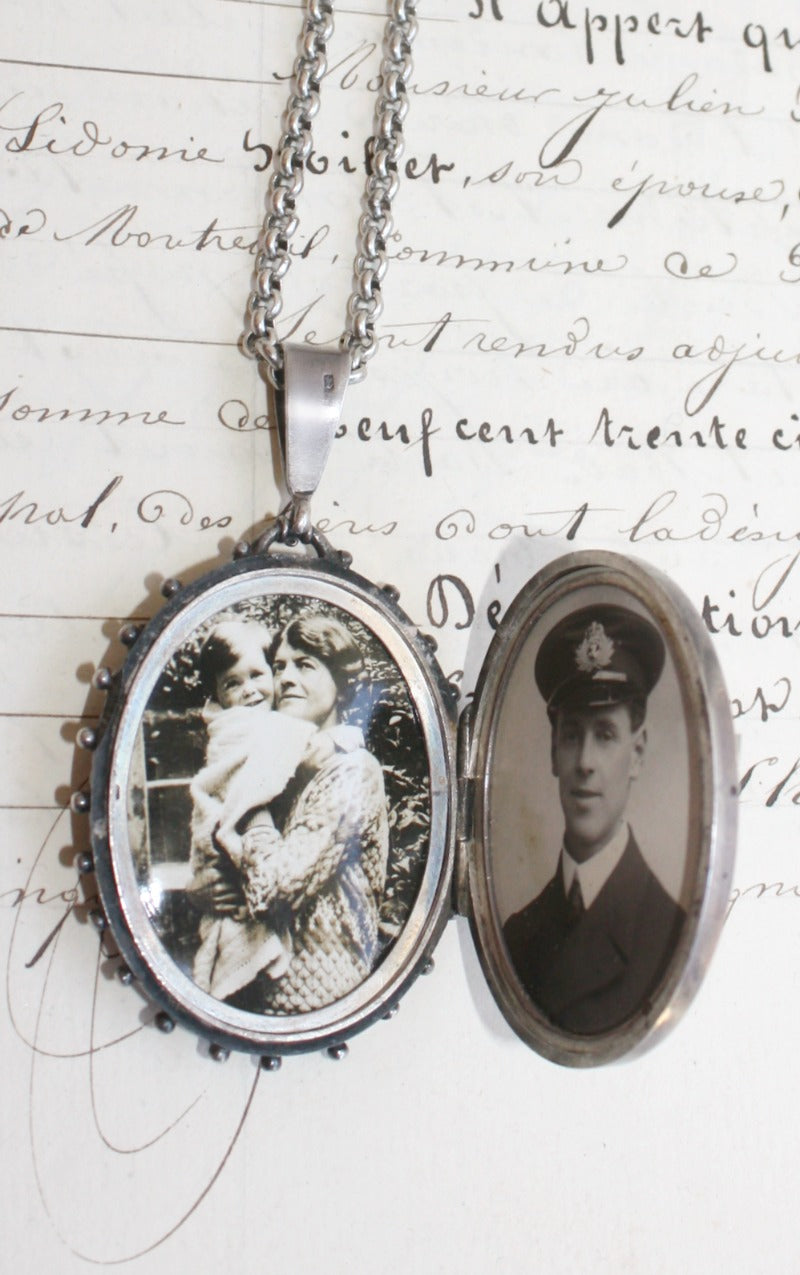 Antique English silver and rose gold locket necklace with Victorian charm. A timeless sentimental heirloom jewelry piece with historic elegance.