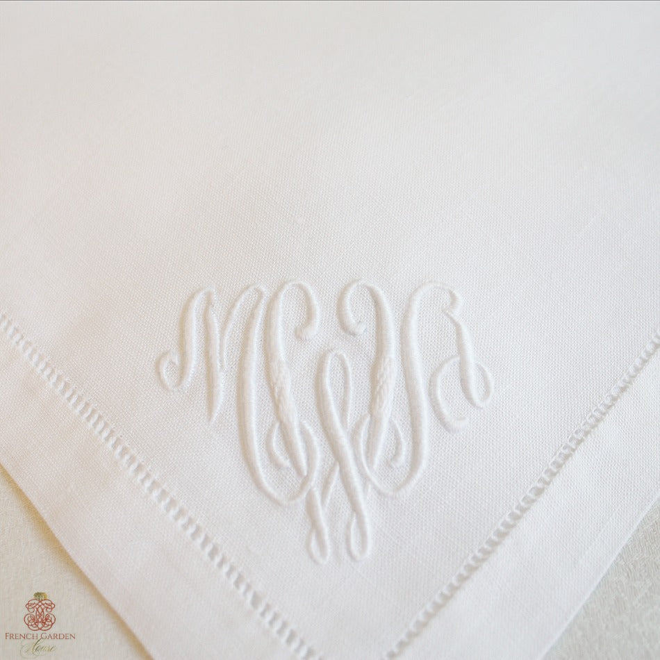 close up of bourdon embroidery on antique linen napkin