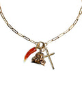 A gold necklace featuring an antique gold monogrammed watch fob, a Victorian agate charm set in gold, and a gold-filled cross, displayed on a white background.