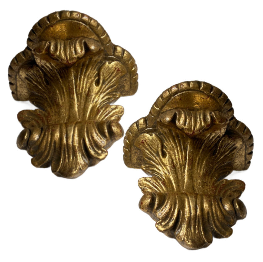 Pair of vintage Italian gilt plaster brackets, with acanthus detail and warm patina. Elegant wall décor for displaying art or adding Italian charm.