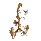 Close-up detail of hand-painted lily flowers on vintage Italian tole wall lights side view