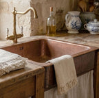 Antique French linen towels styled in a country kitchen