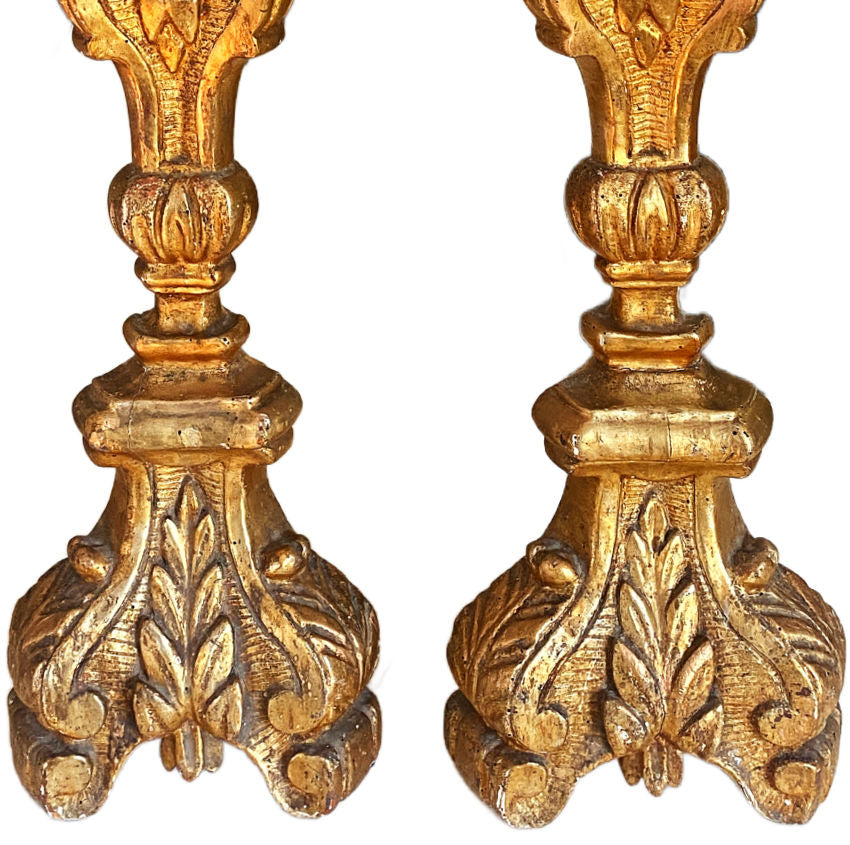 Large 19th-century French gilt altar candlesticks in complementary sizes with gilded fronts. Elegant and luminous, perfect for mantels or luxury interiors.