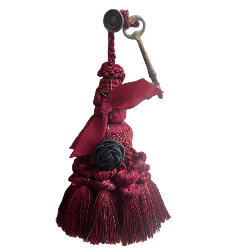 Parisian atelier wine tassel with antique French key, rich woven threads and authentic patina—an elegant French décor accent for styling and collecting.