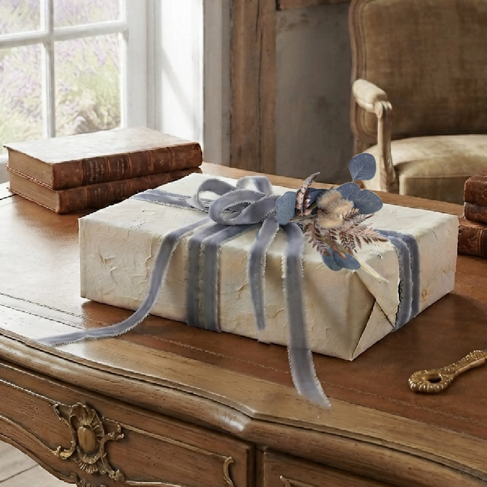 Antique French desk with gray frayed velvet ribbon and miniature bouquet gift wrapping set