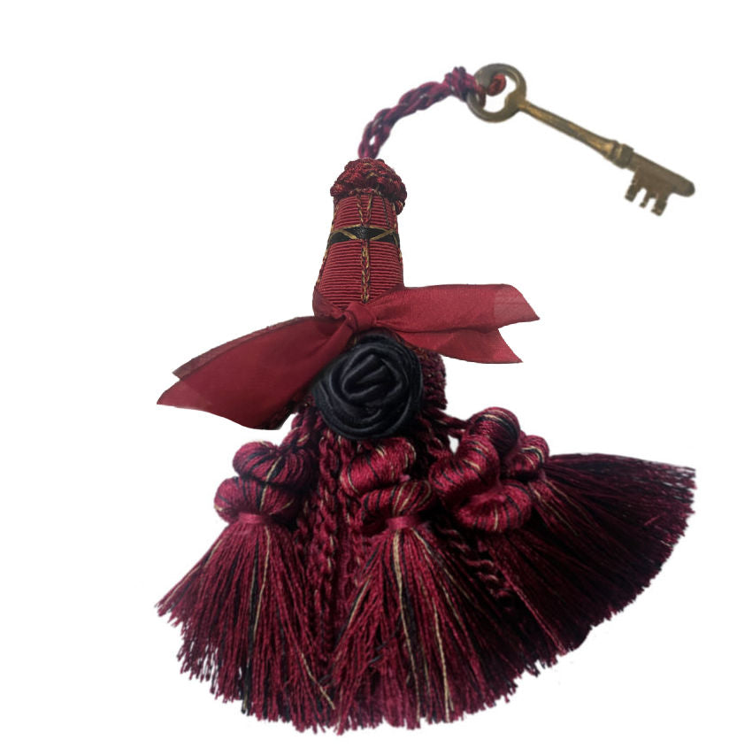 Parisian atelier wine tassel with antique French key, rich woven threads and authentic patina—an elegant French décor accent for styling and collecting.