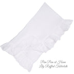 Organic white linen tablecloth with soft 4-inch ruffle edge detail
