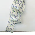 White satin ribbon embellished with lavender flowers for luxury gift wrapping