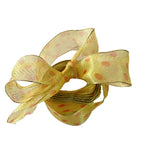 French orange polka dot wired ribbon styled for elegant gift wrapping