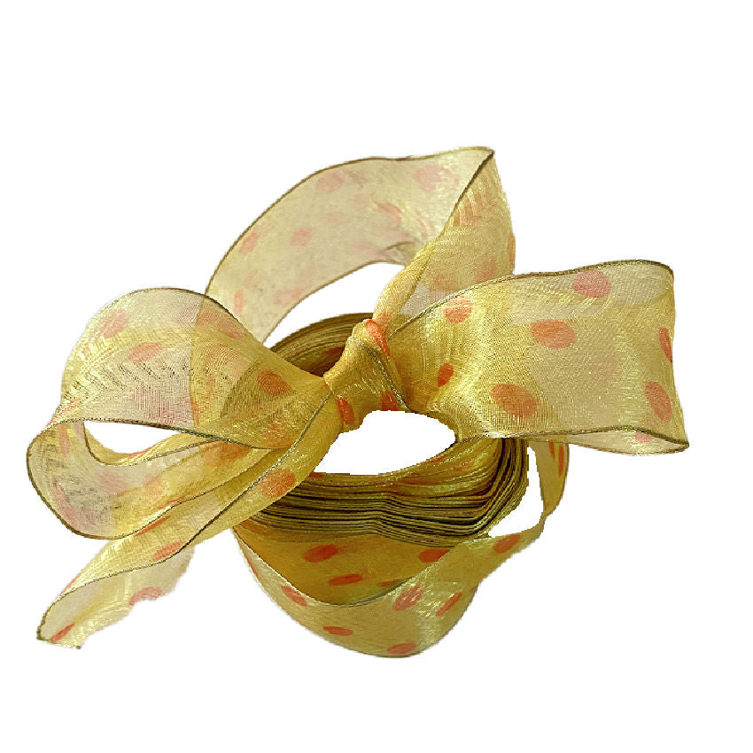 French orange polka dot wired ribbon styled for elegant gift wrapping