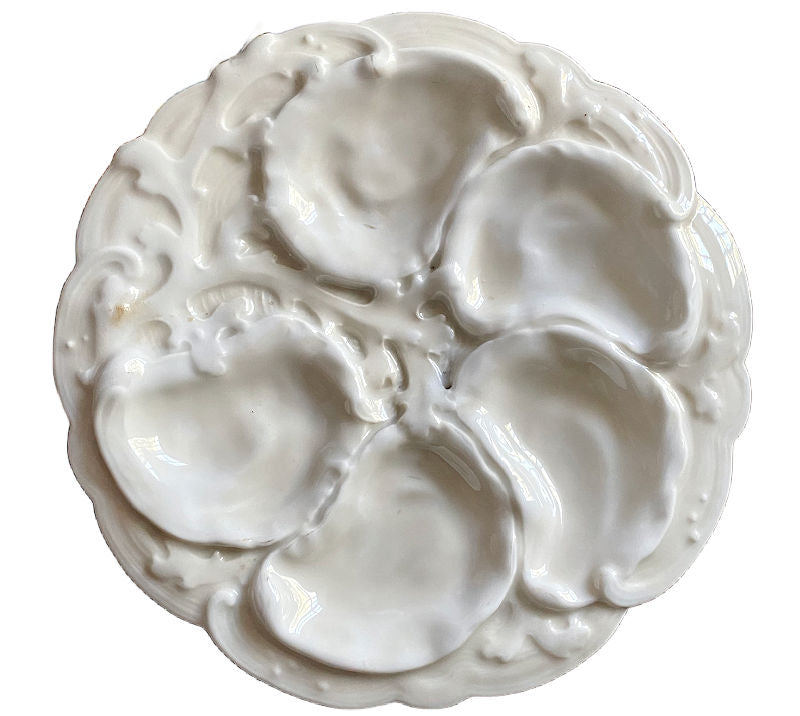 19th Century French Limoges Oyster Plate with seaweed design around the wells for oysters.