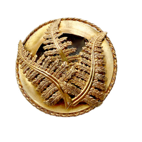 Rare 19th century antique mourning brooch with sculptural fern motif, crafted in high-carat gold with original celluloid keepsake compartment.
