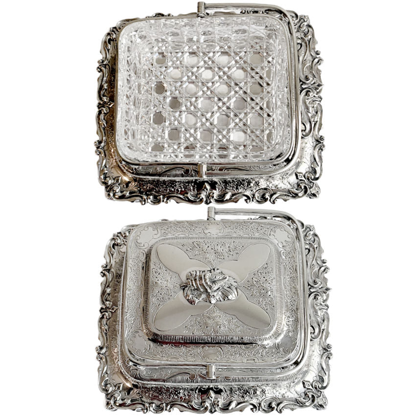 
Ornate antique Mappin & Webb silver-plated sardine server with cut crystal liner and scrolled feet. A rare, collectible English tableware piece.