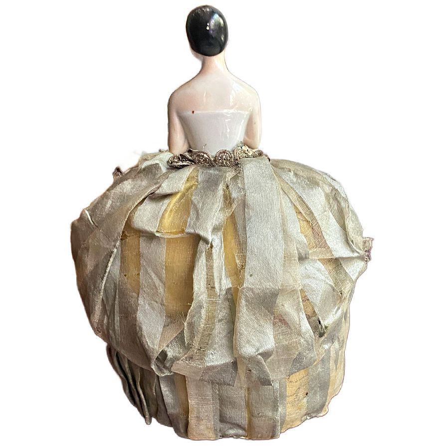 Elegant antique half doll displayed as sewing pincushion with gold embroidery detail back view
