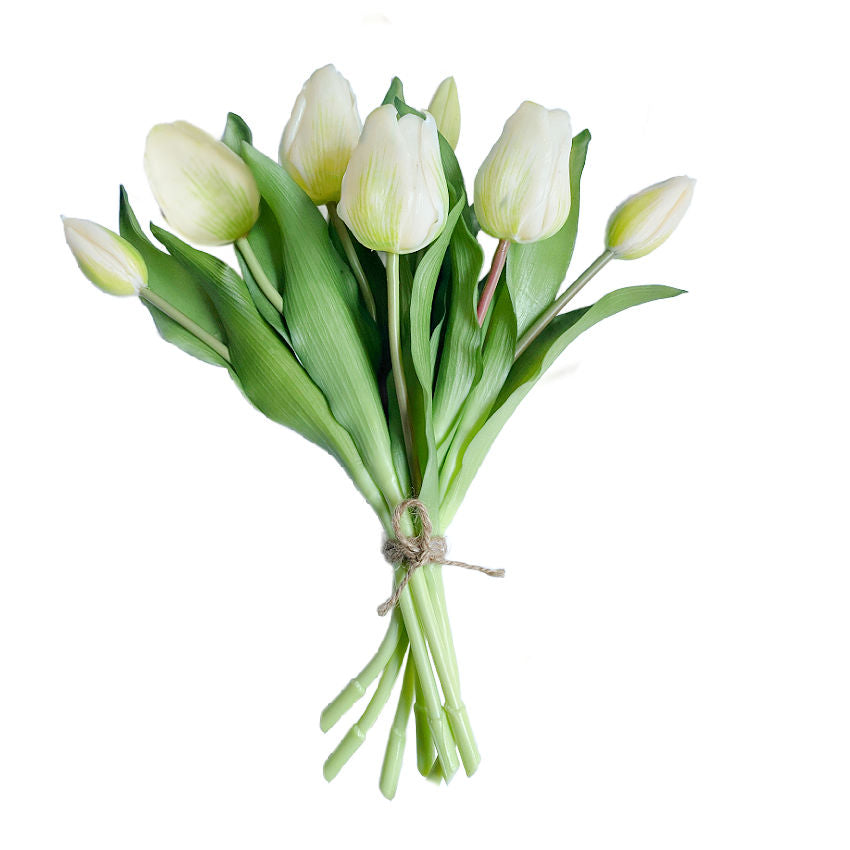 Long a symbol of love, this real touch faux tulip bouquet in white features lifelike petals and lush green leaves for timeless floral elegance.