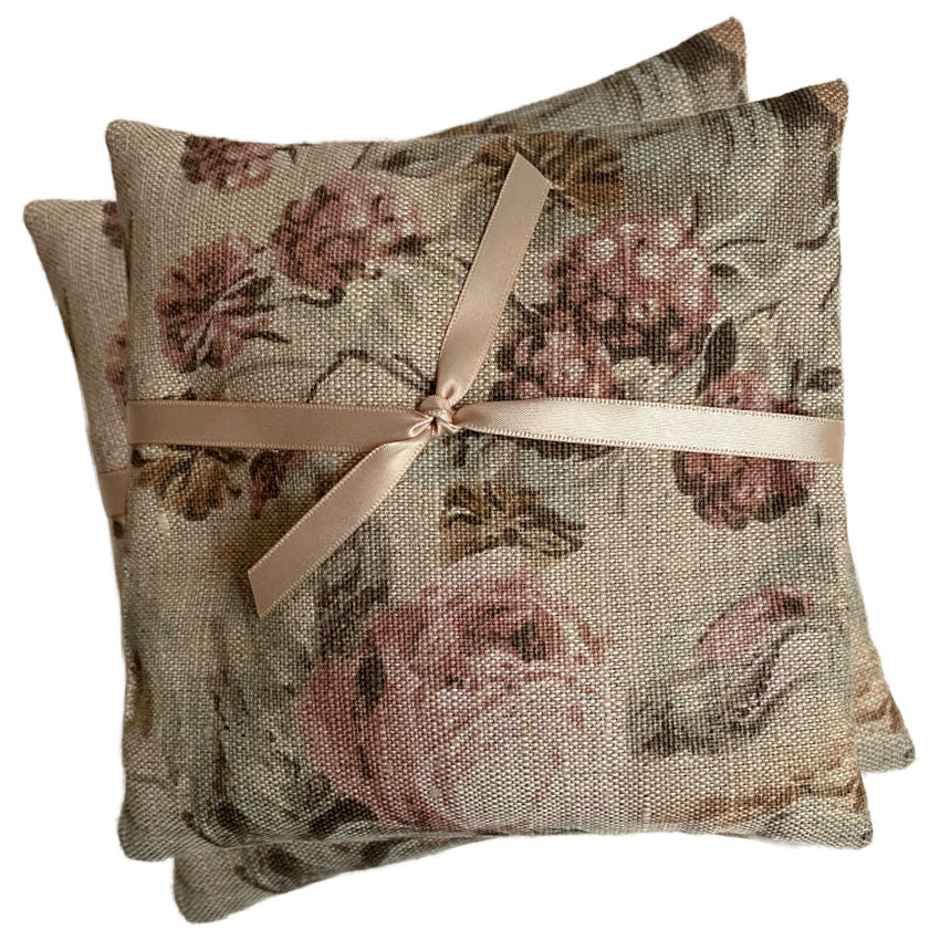 Heirloom oatmeal linen sachet with antique blush roses, filled with fine French lavender. A quiet, refined fragrance for drawers and bedside.