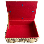 Antique seashell souvenir box showing its original red felt lining