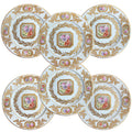Set of six Porcelaine de Paris hand painted floral gilt rim plates