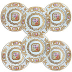 Set of six Porcelaine de Paris hand painted floral gilt rim plates