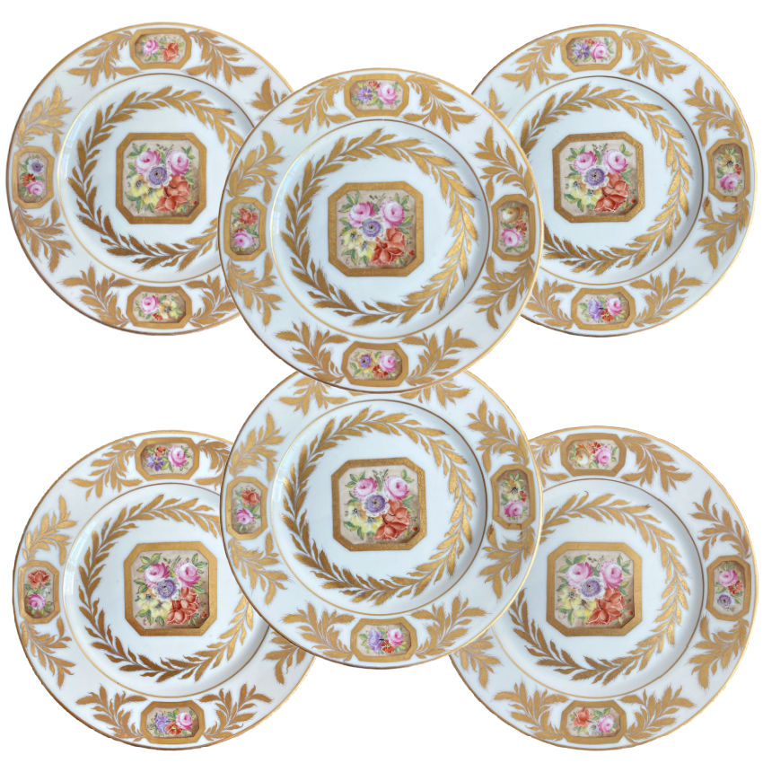 Set of six Porcelaine de Paris hand painted floral gilt rim plates