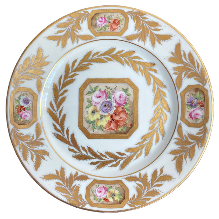 Porcelaine de Paris hand painted floral plate with gilt rim and rose cartouche detail
