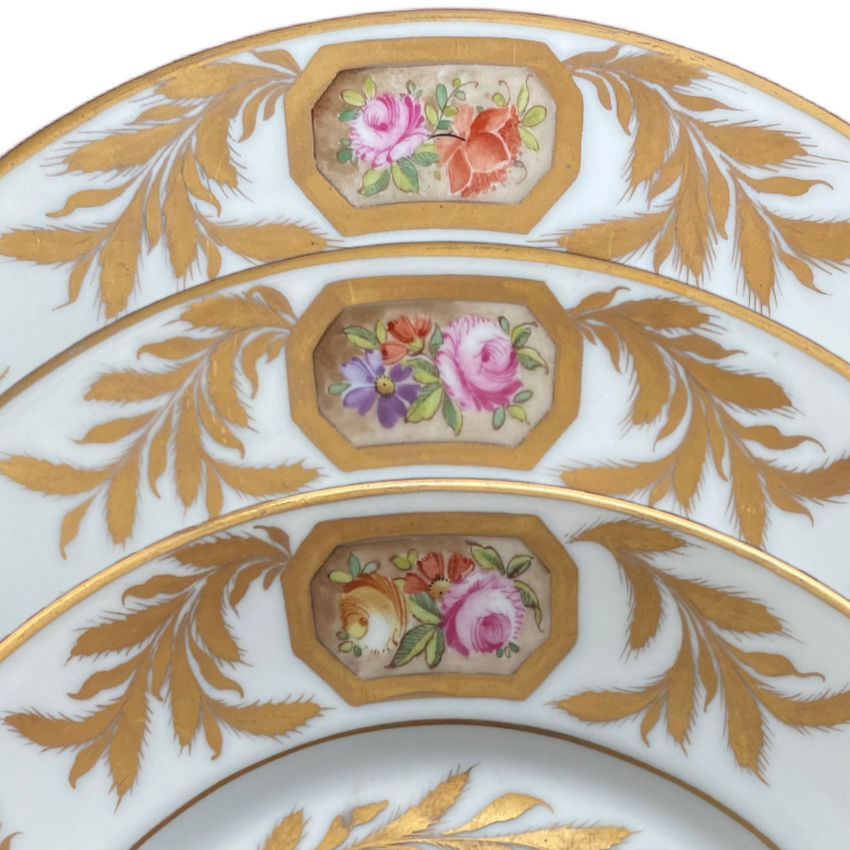 Hand painted French porcelain plates with garden floral rim decoration