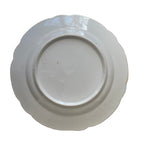 set of matching antique porcelain plates with creamy white ground and gold trim gold mark