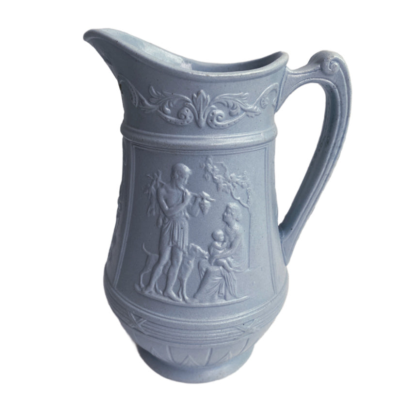 Mid-19th century graduated decorative pitchers