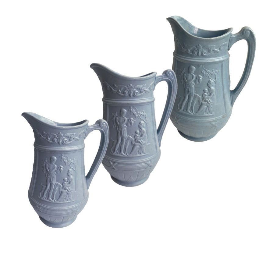 Antique European pale blue earthenware pitchers
