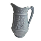 Mid-19th century graduated decorative pitchers