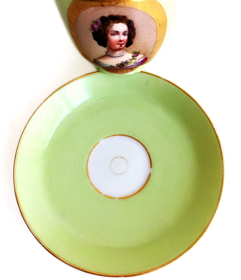 Antique French Sevres Vieux Paris porcelain saucer in rare apple green, hand-painted with  gilt accents. A charming collectible from a European estate, perfect for antique French porcelain enthusiasts.