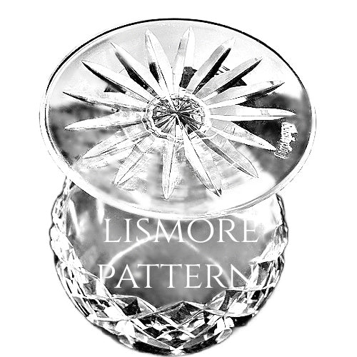 A refined set of four signed Waterford Lismore crystal brandy glasses, beautifully preserved with brilliant diamond and wedge cuts. Timeless Irish craftsmanship for elegant entertaining.