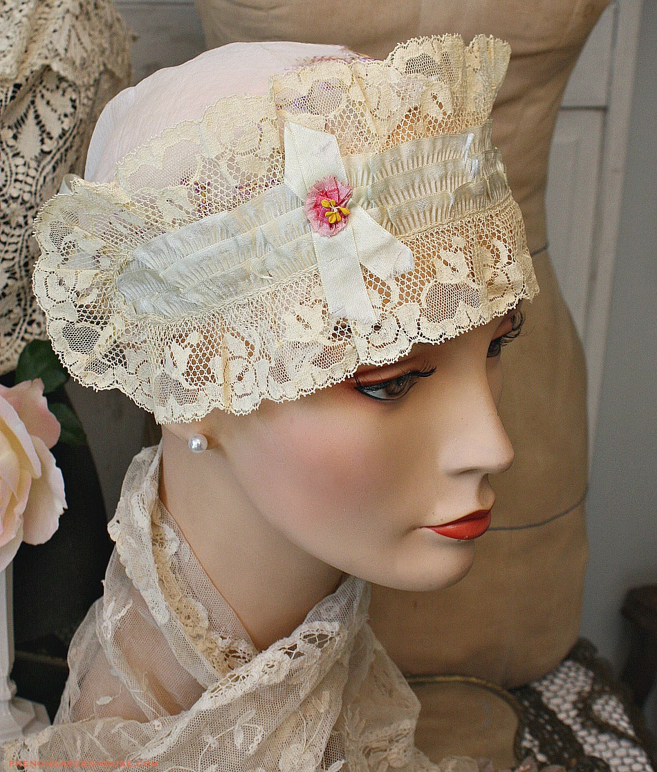 Exceptional antique French silk lace cap with robin’s egg blue ribbons, pink rosette, cream net lace. Rare early 1900s pre-flapper headpiece, on antique mannequin
