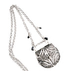 Silver purse pendant necklace with onyx and black crystal accents, 19th-century inspired, hidden compartment, antique-style collectible jewelry.