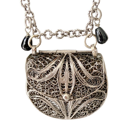 Silver purse pendant necklace with onyx and black crystal accents, 19th-century inspired, hidden compartment, antique-style collectible jewelry.