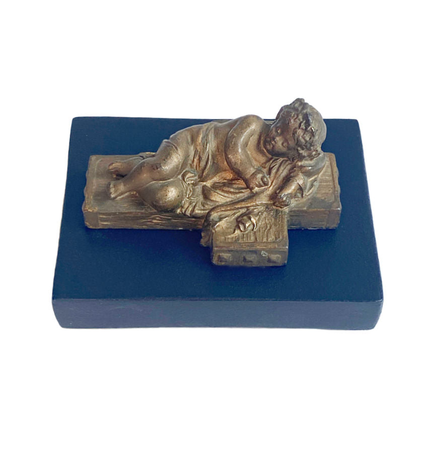 Small bronze angel sculpture with original wood platform
