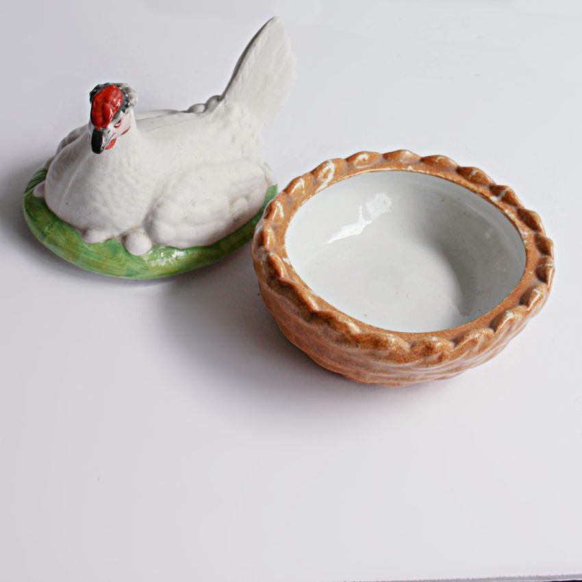 Interior view of 19th century Staffordshire Hen on Nest Tureen, English hand-painted basket form with glazed interior, showing intact condition.