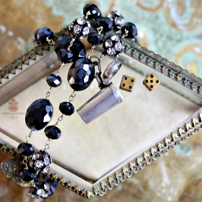 Art Deco sterling dice charm necklace with miniature dice case, 34" black Czech glass chain, decorative rhinestones, elegant, rare, collectible jewelry.