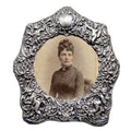 Sterling SiIver English Cherub repousse Frame with antique photo of beautiful woman