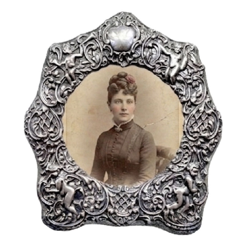 Sterling SiIver English Cherub repousse Frame with antique photo of beautiful woman