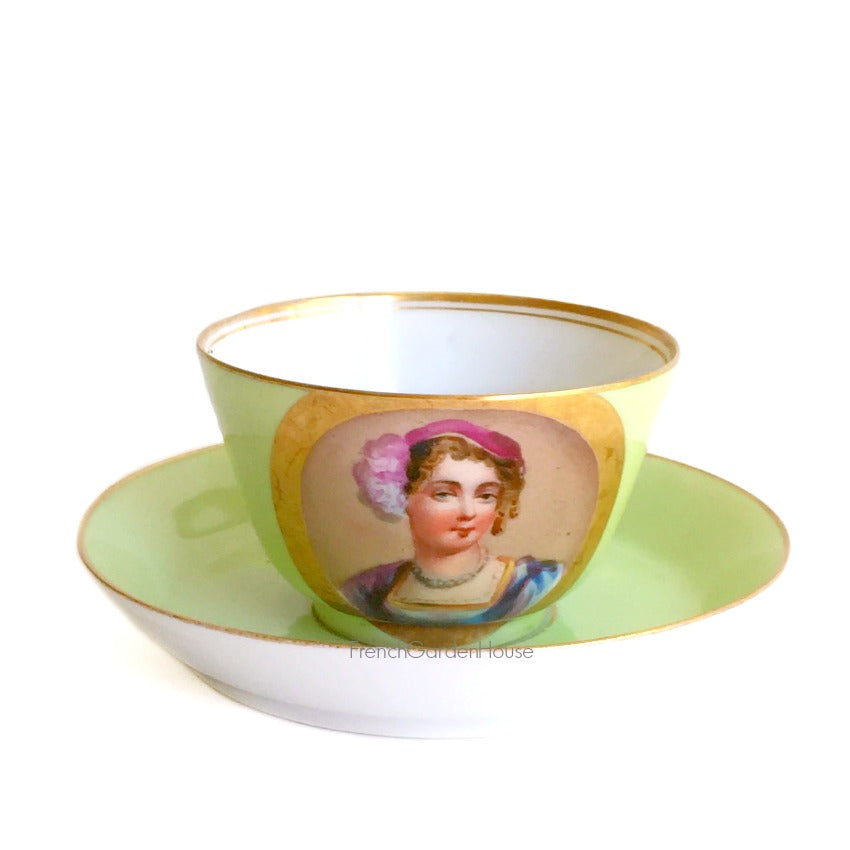 Antique French Vieux Paris porcelain tea cup and saucer in rare apple green Sèvres style, hand-painted with delicate female portrait & gilt accents. A charming collectible from a European estate, perfect for antique French porcelain enthusiasts.