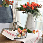 French red Striped towel in kitchen with roses and French country basket with red apples