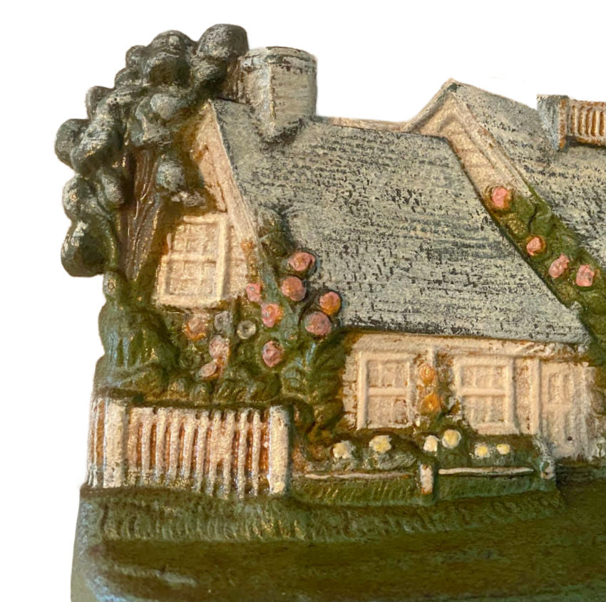 Vintage Hubley doorstop floral cottage design with garden detail