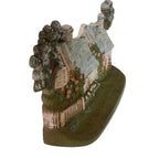 Cast iron cottage doorstop floral garden scene collectible piece side view