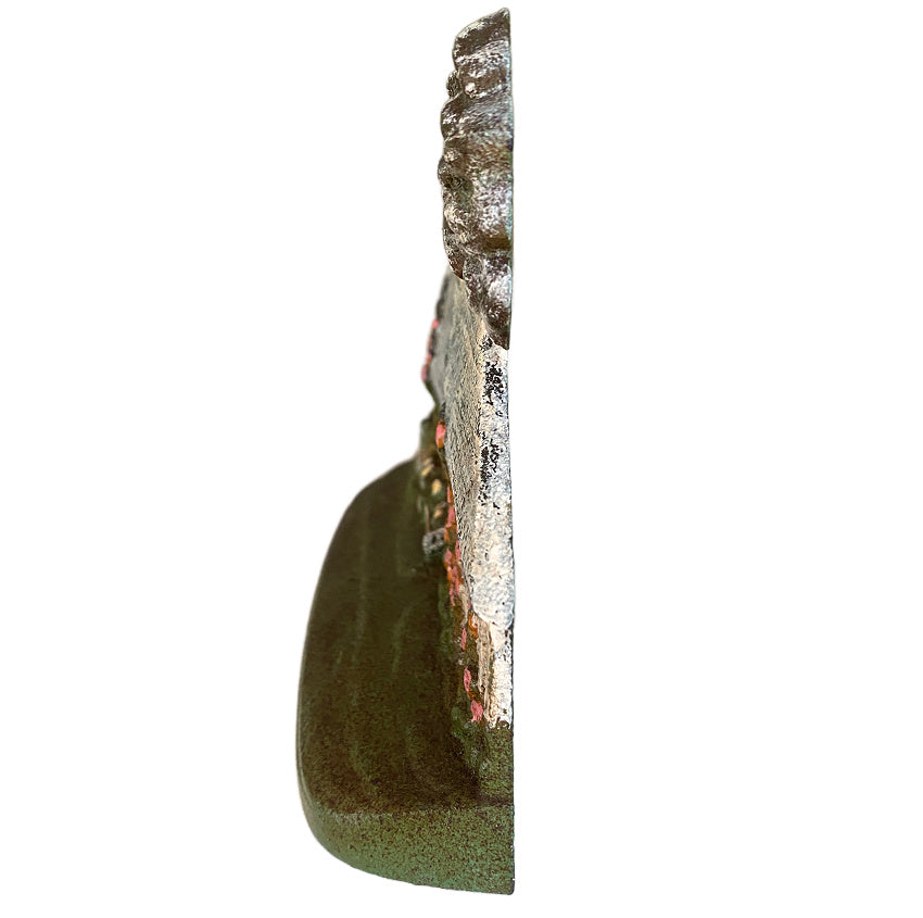 Hubley cottage doorstop early 1900s floral decorative cast iron door stop side