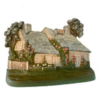1920s Hubley cottage doorstop with climbing roses cast iron garden scene
